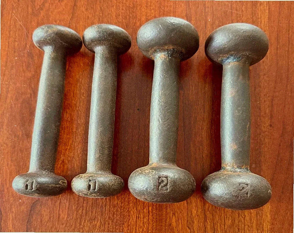 2 Pairs of Vintage cast iron bun head dumbbells. 1 Pair of 1LB's 1 Pair of 2LB's