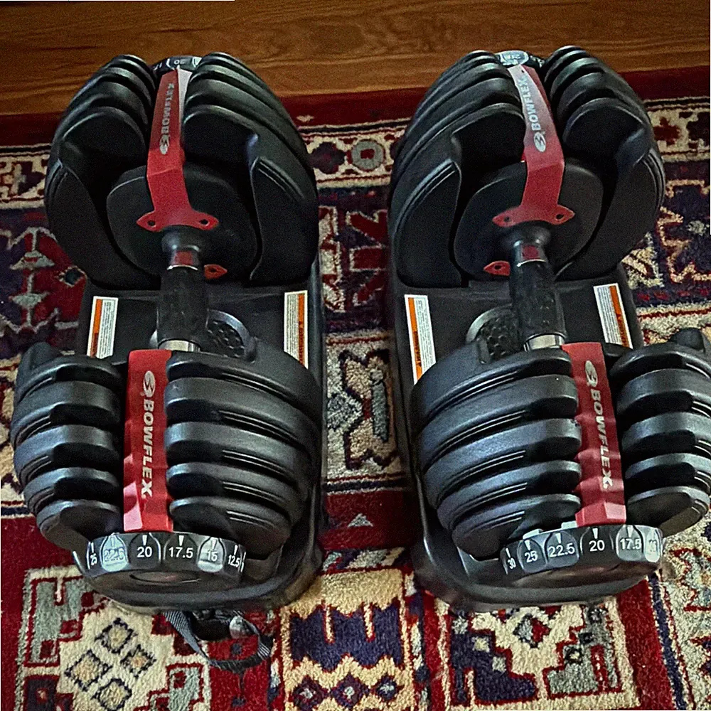 Bowflex SelectTech 552 Adjustable Dumbbells 52.5 lb Pair w/ Stands Black/Red