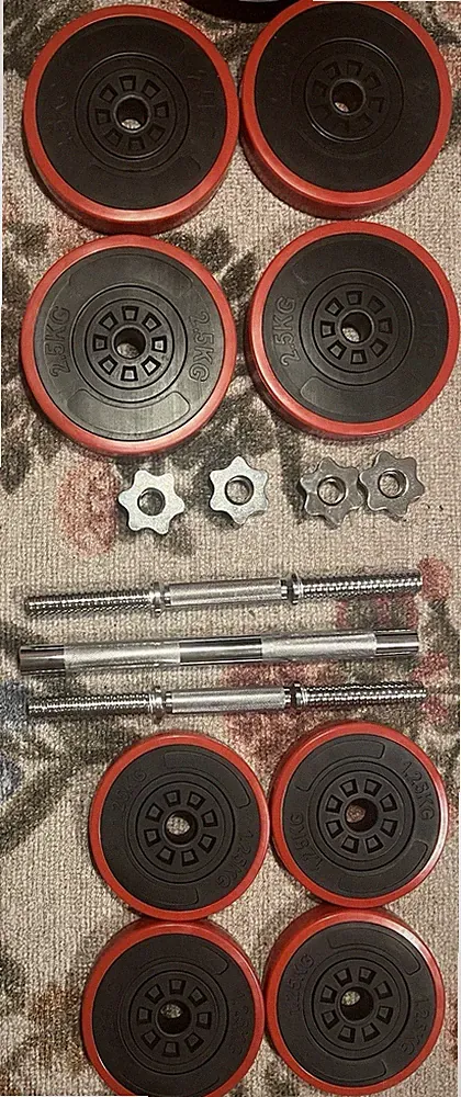Dumbells That Can Become A Barbell With 4 Plates Of 2.5KG And 4 Plates Of 1.25KG