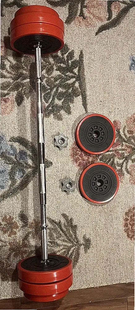 Dumbells That Can Become A Barbell With 4 Plates Of 2.5kg And 4 Plates Of 1.25kg