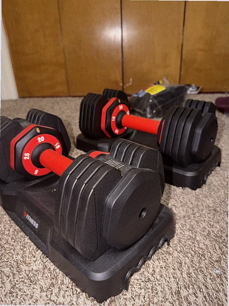 GIKPAL adjustable dumbbells. Weights between 15 and 25 pounds