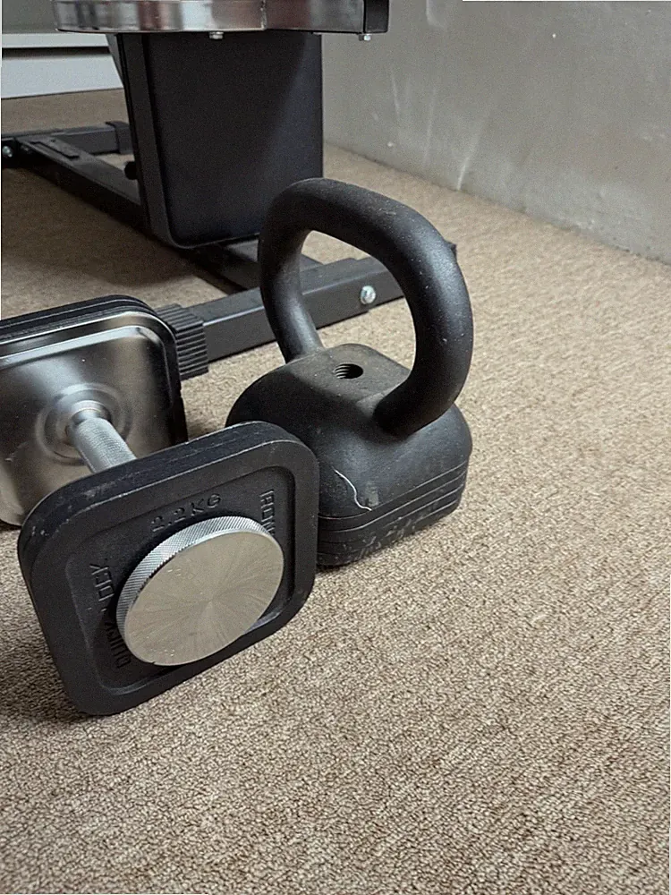 Iron master super bench with an, pull up, leg attachments dumbell barbell