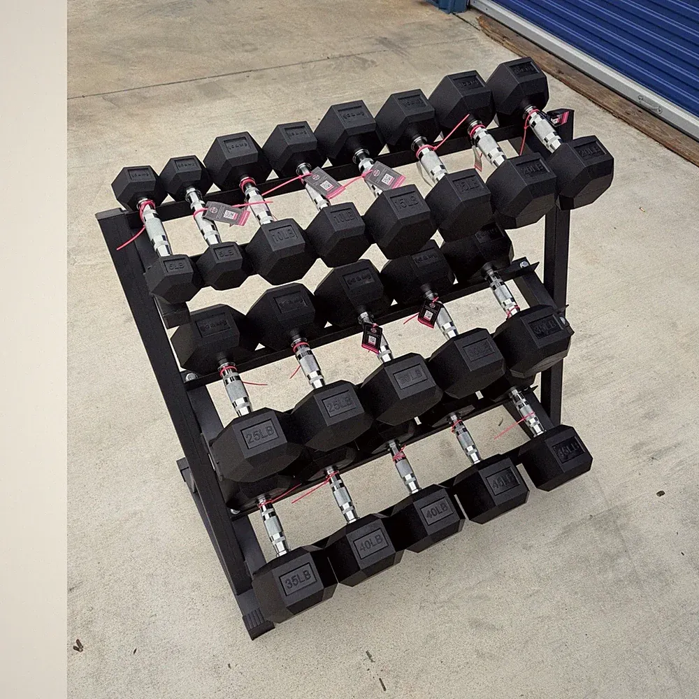 New in box! Pair of 5-45lb rubber dumbbells with rack