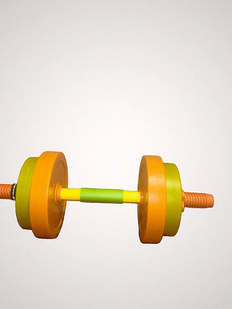plastic toy dumbbell . Photo Prop
