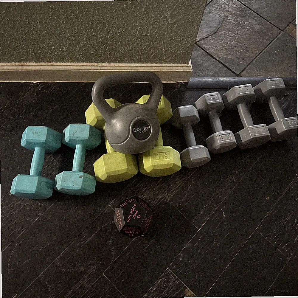 Women’s Dumbbell Set And kettlebell And A Workout Die